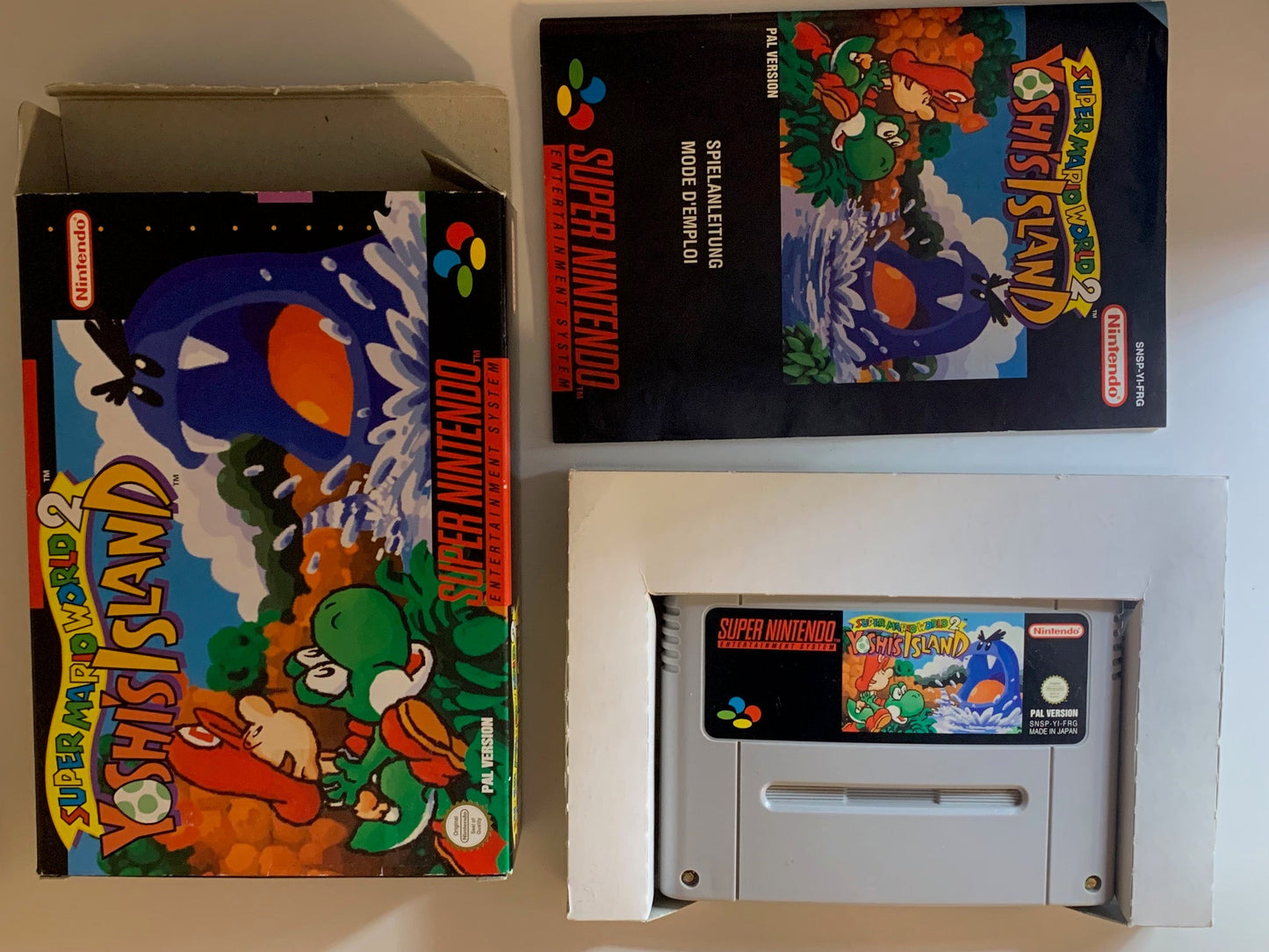 SNES - Super Mario World 2: Yoshi's Island OVP - PAL Version DE, FR